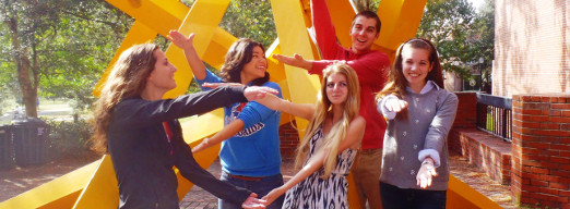 Exploratory students do the Gator chomp. Exploratory students do the Gator chomp.